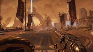 The player spawns at the very beginning of the Hebeth chapter in DOOM: The Dark Ages, and looks out towards some flags and a dusty landscape