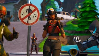 A Fortnite character doing a love heart emote next to an anti-dancing sign.