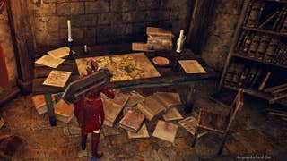 The Duchess looks at a map inside of a castle where a local clue can be acquired in Elden Ring: Nightreign